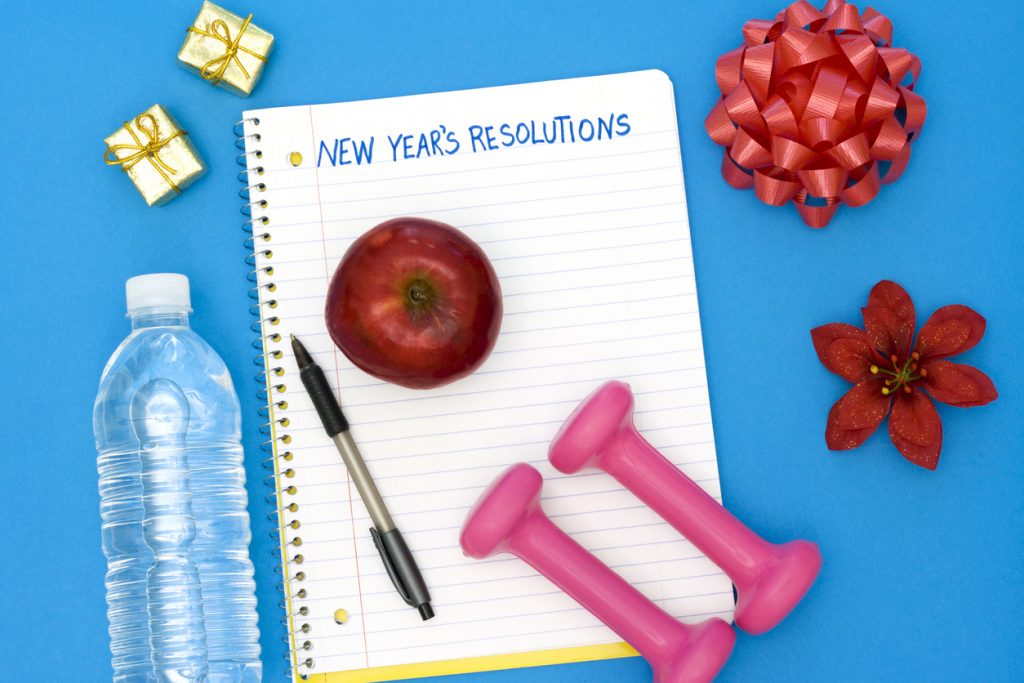 Note pad with New Year's Resolutions written