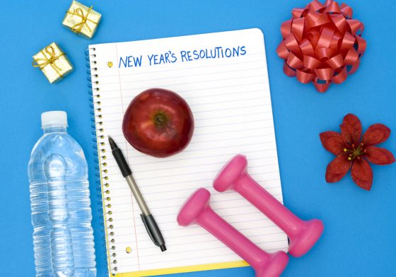 Note pad with New Year's Resolutions written