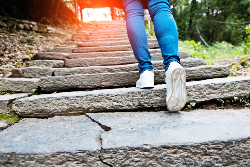 person climbing steps