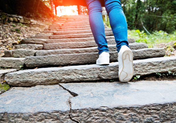 person climbing steps